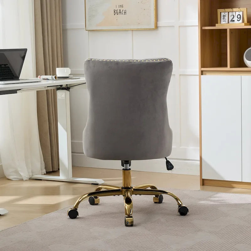 Sedia da ufficio girevole imbottita in velluto grigio, base dorata