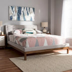 Letto con piattaforma imbottito in tessuto contemporaneo con testiera ad alette