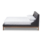 Letto con piattaforma imbottito in tessuto contemporaneo con testiera ad alette