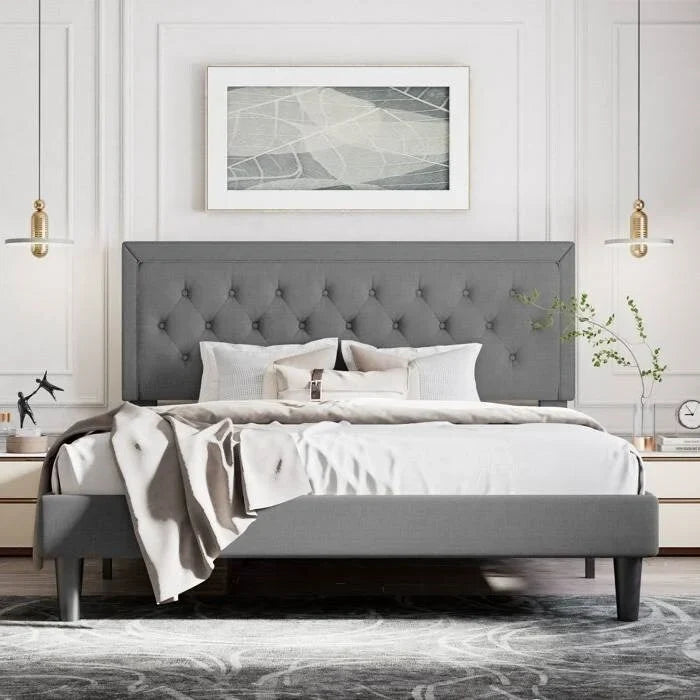 Letto a piattaforma regolabile in altezza con rivestimento in lino e testiera capitonné